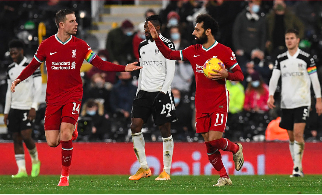 Liverpool midfielder Jordan Henderson and forward Mohamed Salah