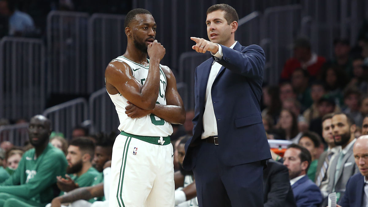 Boston Celtics guard Kemba Walker, head coach Brad Stevens