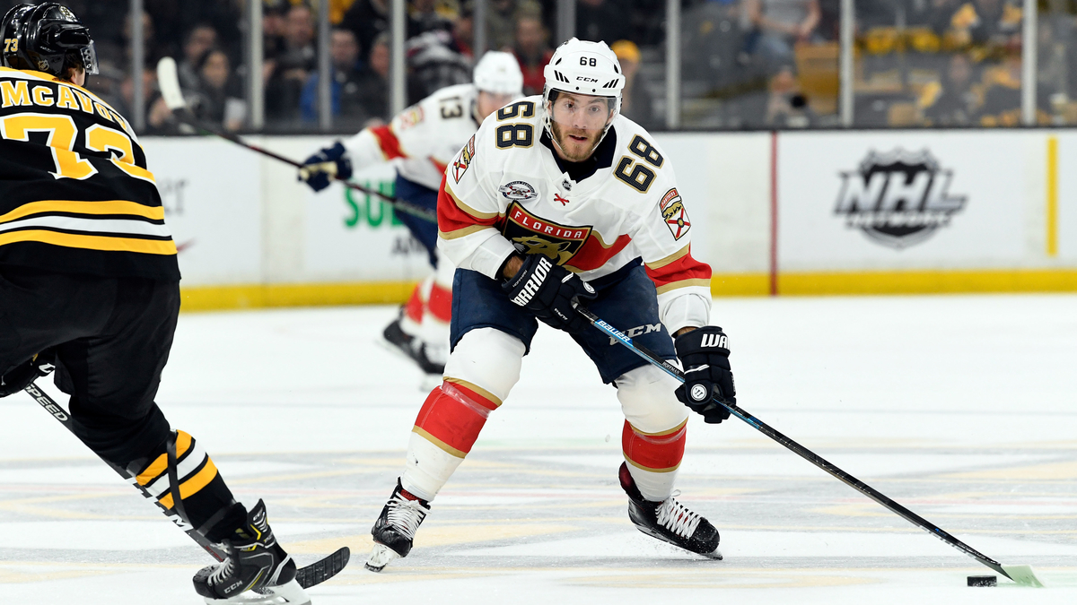 Free agent winger Mike Hoffman, Boston Bruins defenseman Charlie McAvoy