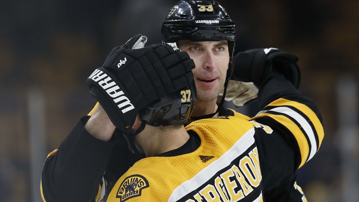 Boston Bruins center Patrice Bergeron, retired defenseman Zdeno Chara