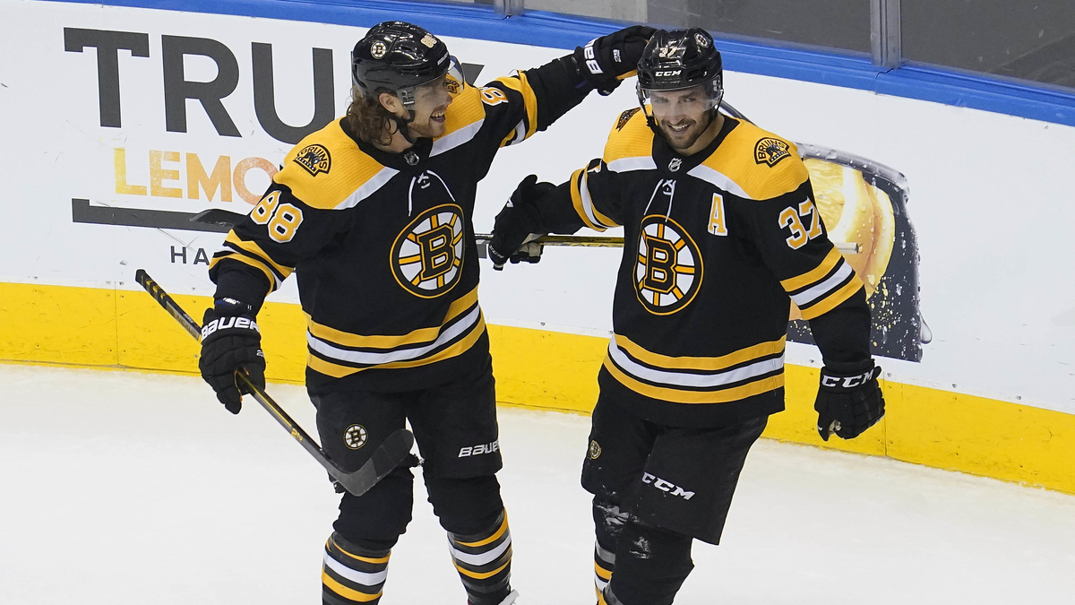 Boston Bruins center Patrice Bergeron, right wing David Pastrnak