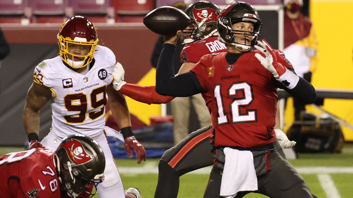 Washington Football Team defensive lineman Chase Young and Tampa Bay Buccaneers quarterback Tom Brady