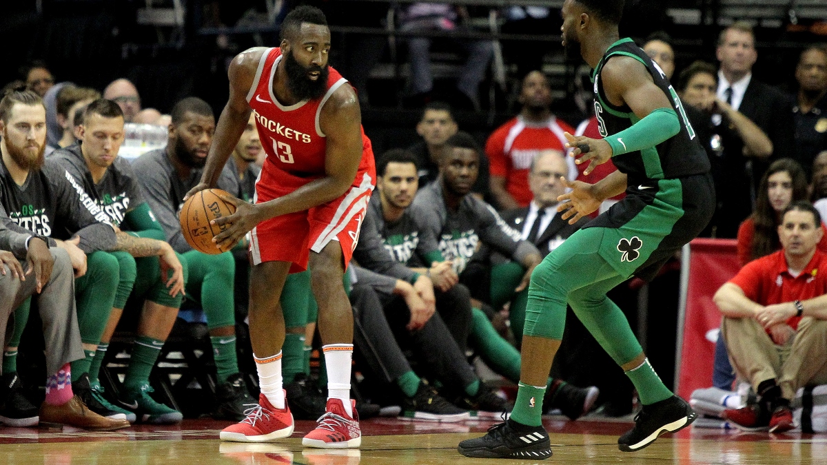 Brooklyn Nets guard James Harden (13) and Boston Celtics forward Jaylen Brown (7)