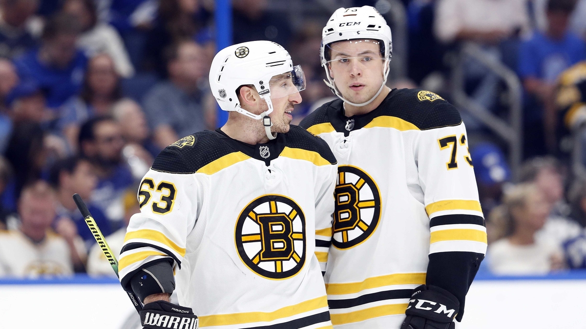 Boston Bruins winger Brad Marchand, defenseman Charlie McAvoy