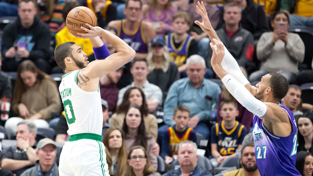 Boston Celtics forward Jayson Tatum and Utah Jazz center Rudy Gobert