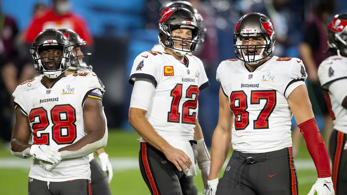 Tampa Bay Buccaneers running back Leonard Fournette and quarterback Tom Brady