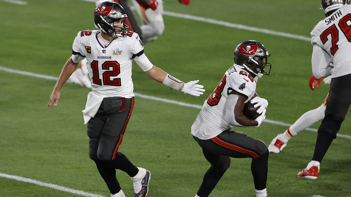 Tampa Bay Buccaneers quarterback Tom Brady and running back Leonard Fournette