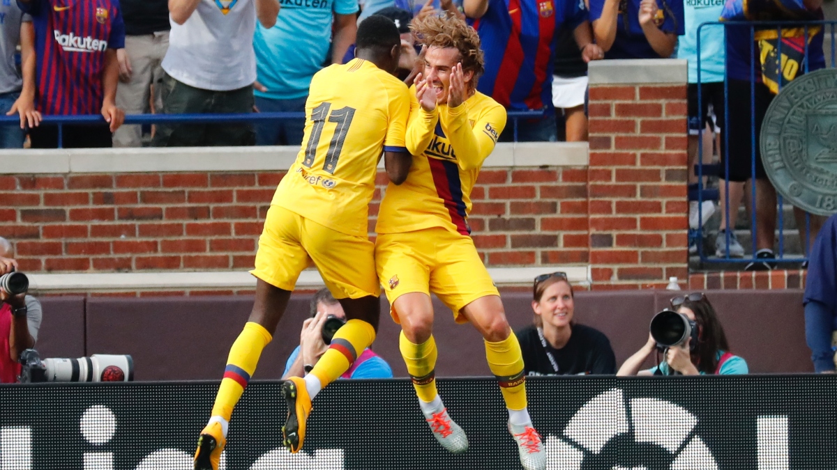 Barcelona forwards Ousmane Dembele (11) and Antoine Griezmann (17)