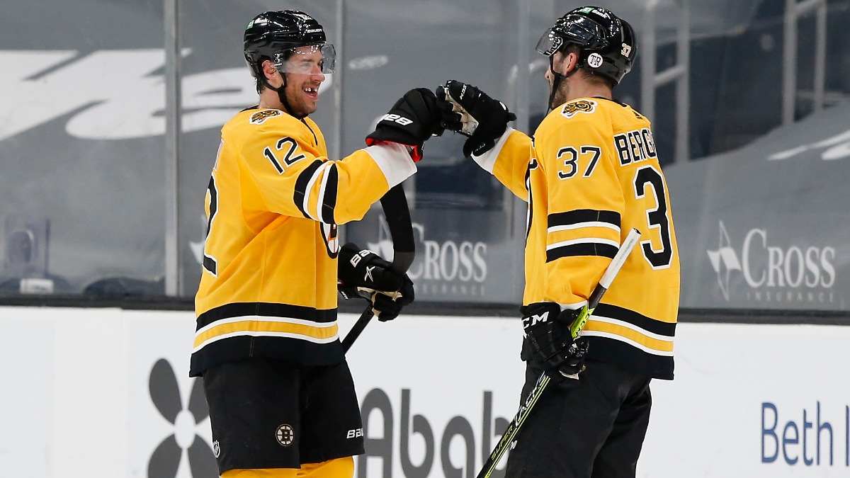 Boston Bruins Forwards Craig Smith, Patrice Bergeron