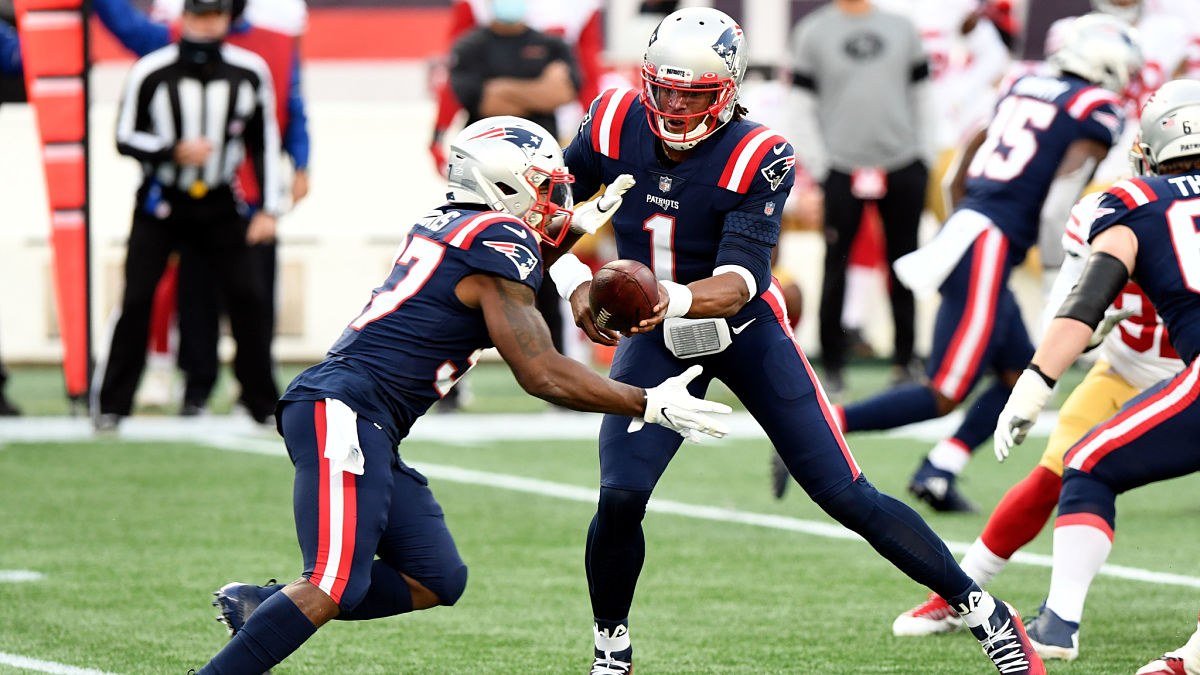 New England Patriots running back Damien Harris and quarterback Cam Newton