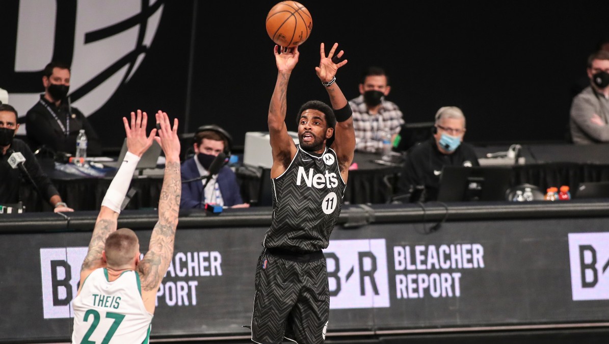 Boston Celtics forward Daniel Theis and Brooklyn Nets guard Kyrie Irving