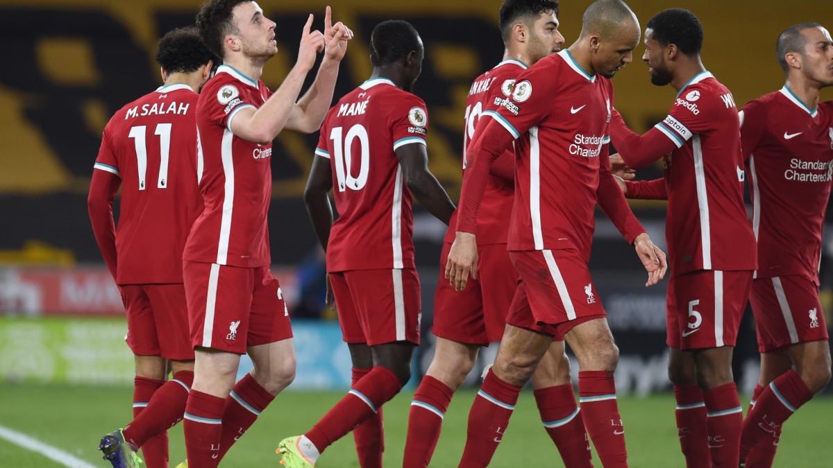 Liverpool forward Diogo Jota (front) and teammates