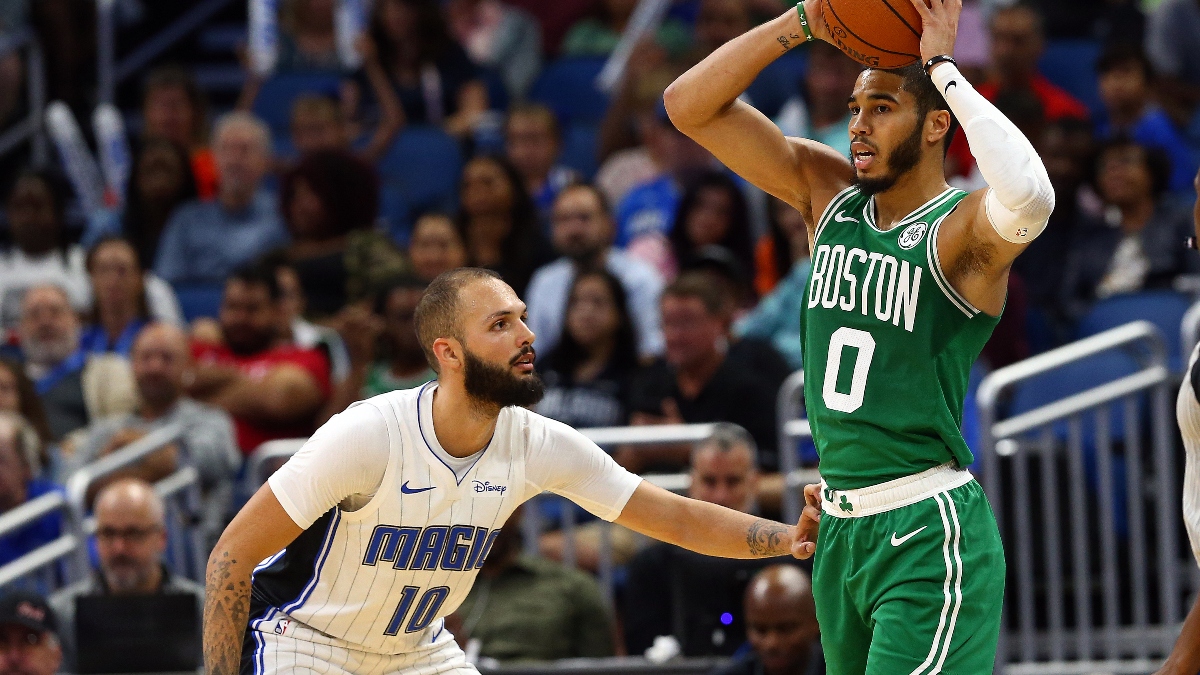 Boston Celtics forwards Evan Fournier (left) and Jayson Tatum (right)
