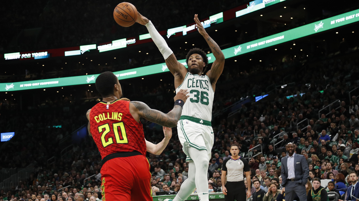 Boston Celtics guard Marcus Smart, Atlanta Hawks forward John Collins