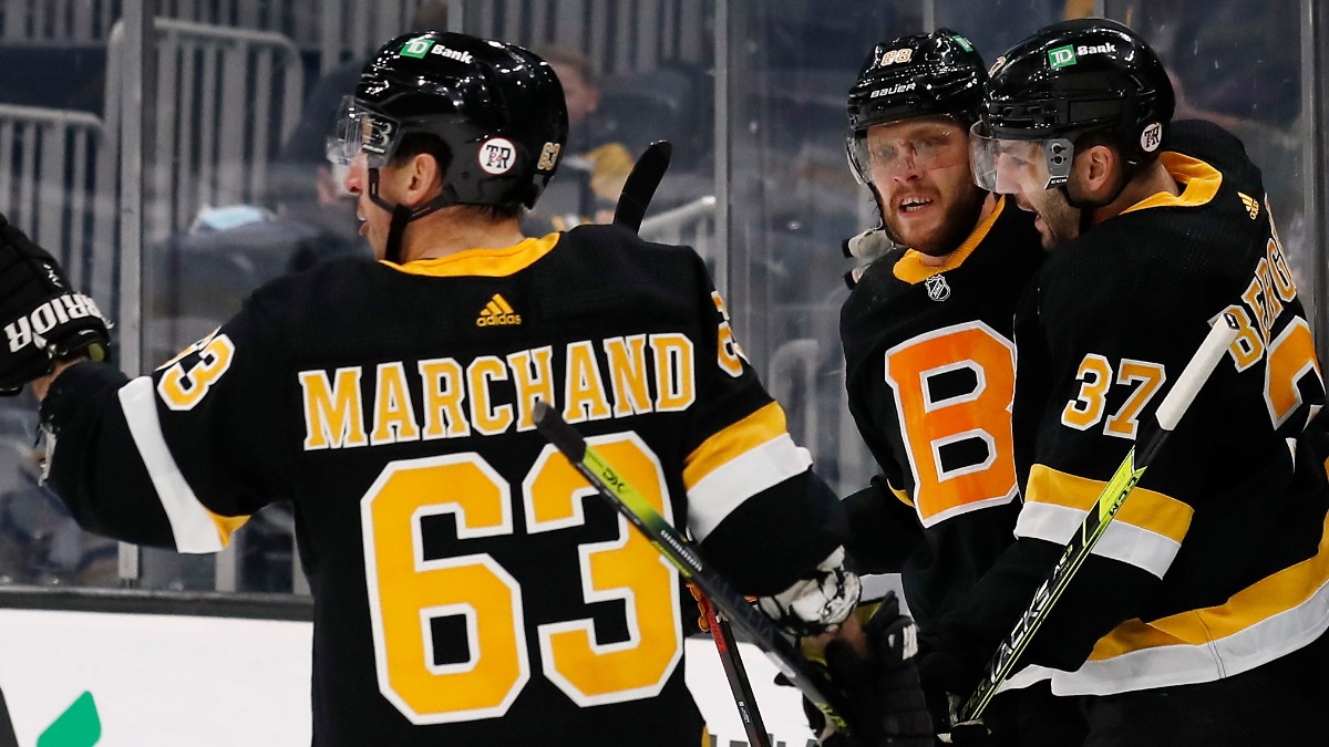 Boston Bruins forwards Brad Marchand, Patrice Bergeron and David Pastrnak