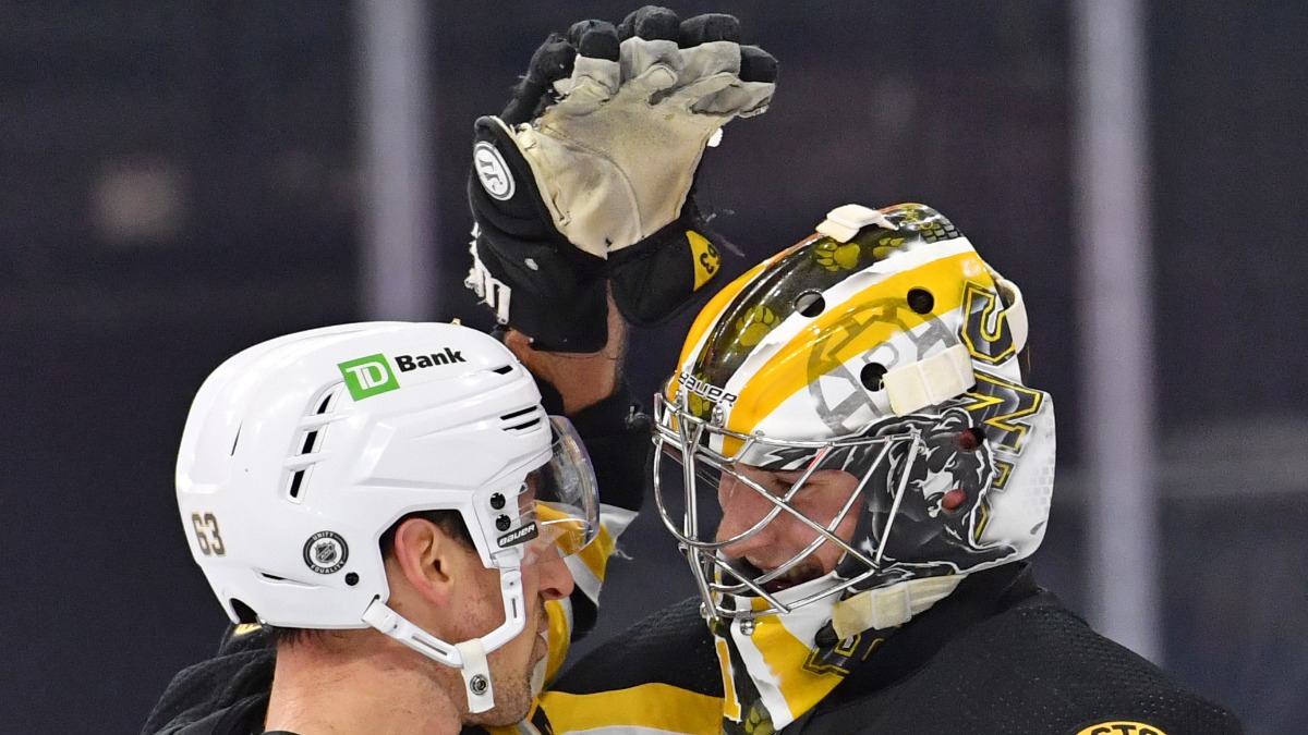 Boston Bruins Forward Brad Marchand, Goaltender Jeremy Swayman
