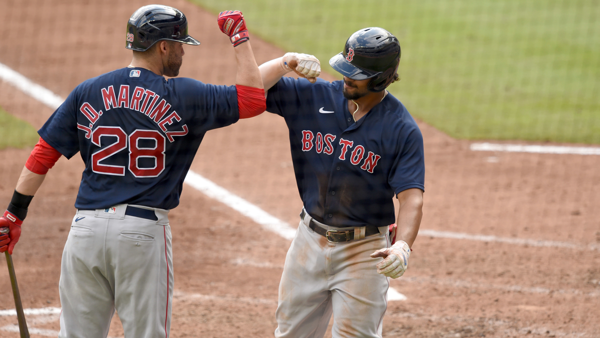 Boston Red Sox Designated Hitter J.D. Martinez And Shortstop Xander Bogaerts