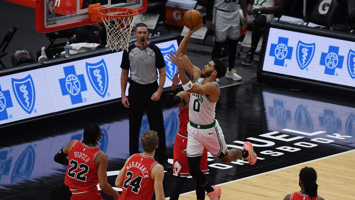 Boston Celtics forward Jayson Tatum (0) and Chicago Bulls players