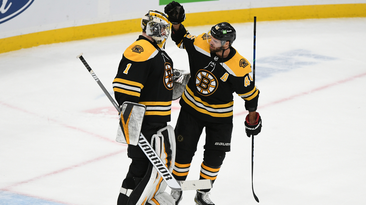 Boston Bruins Goalie Jeremy Swayman And Center David Krejci