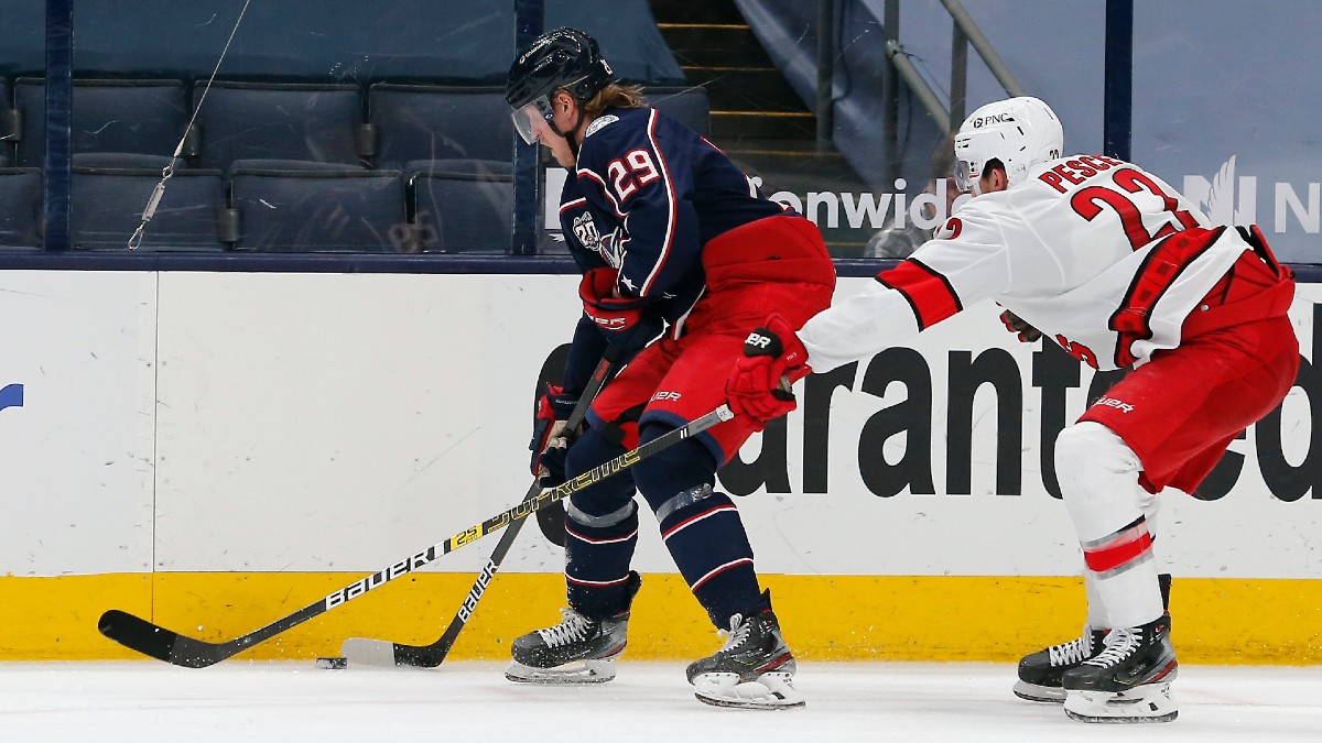 Columbus Blue Jackets winger Patrik Laine, Carolina Hurricanes defenseman Brett Pesce