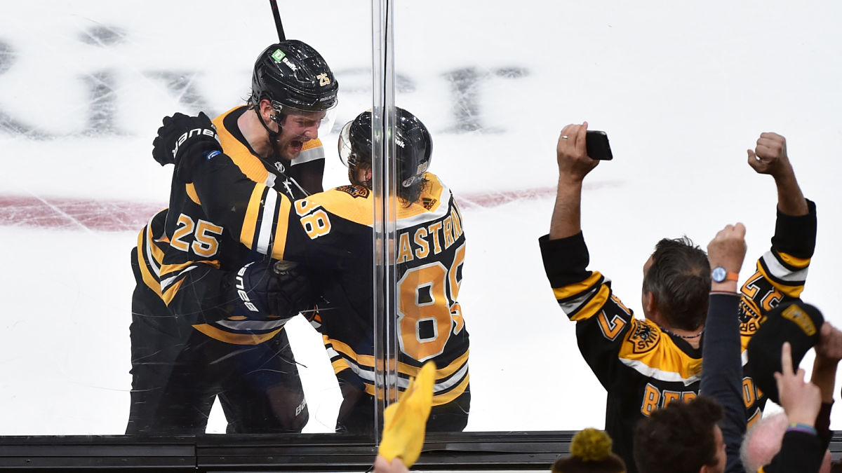 Boston Bruins defenseman Brandon Carlo, forward David Pastrnak
