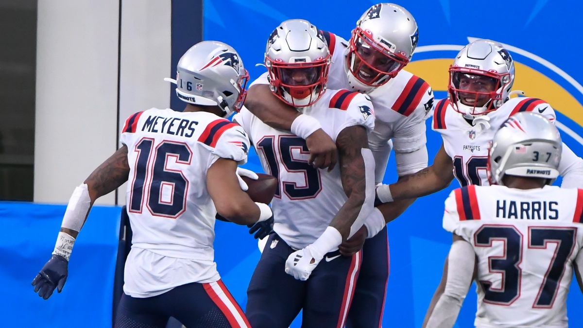 New England Patriots wide receivers N'Keal Harry (15) and Jakobi Meyers (16) and quarterback Cam Newton (1)
