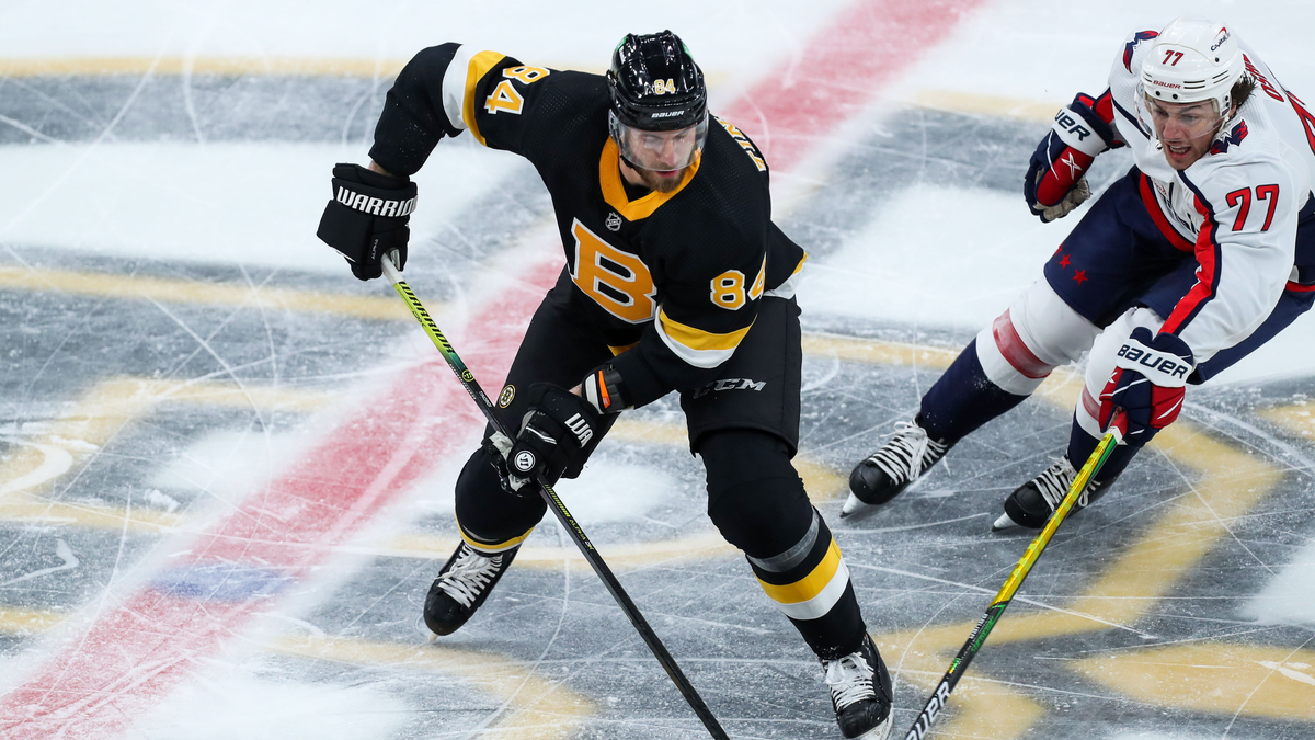 Boston Bruins defenseman Jarred Tinordi, Washington Capitals forward T.J. Oshie