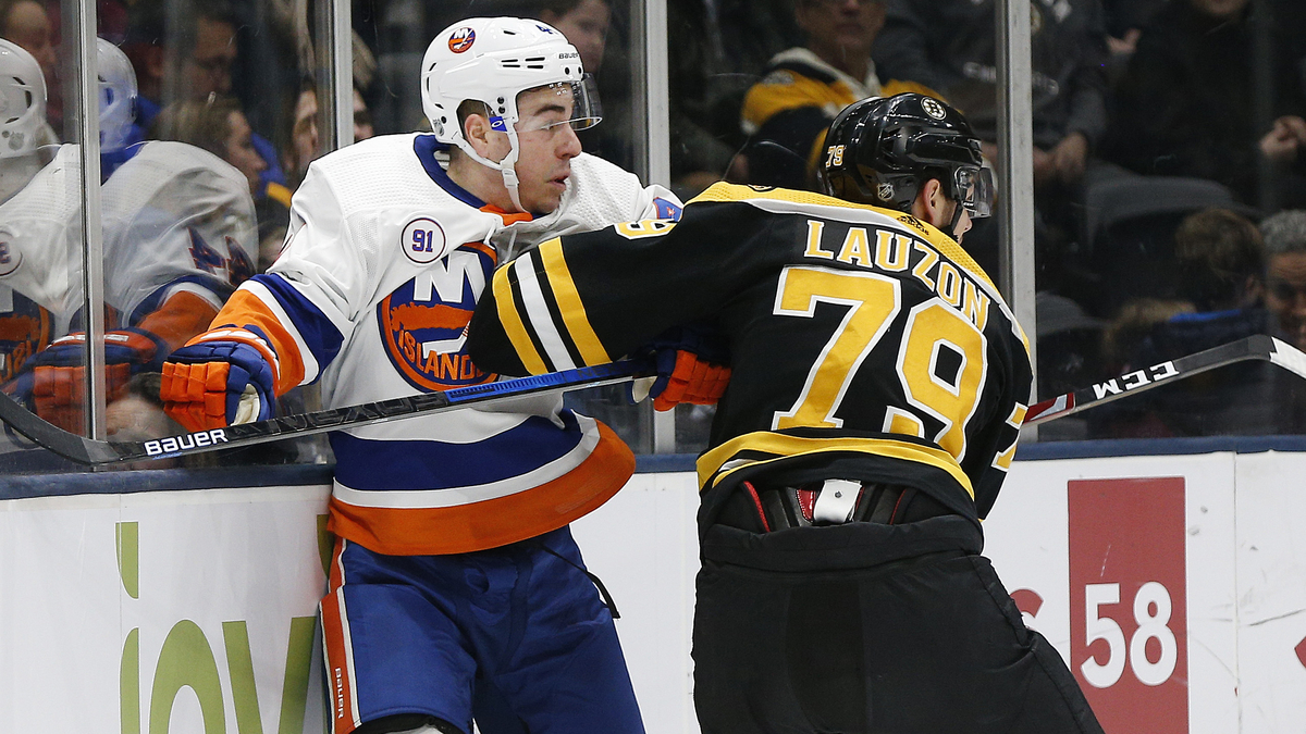 Boston Bruins defenseman Jeremy Lauzon, New York Islanders center Jean-Gabriel Pageau