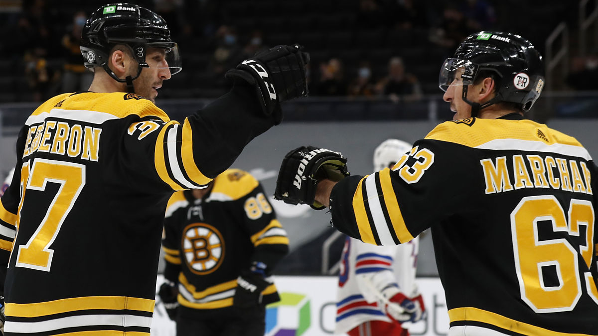 Bruins forwards Patrice Bergeron, Brad Marchand