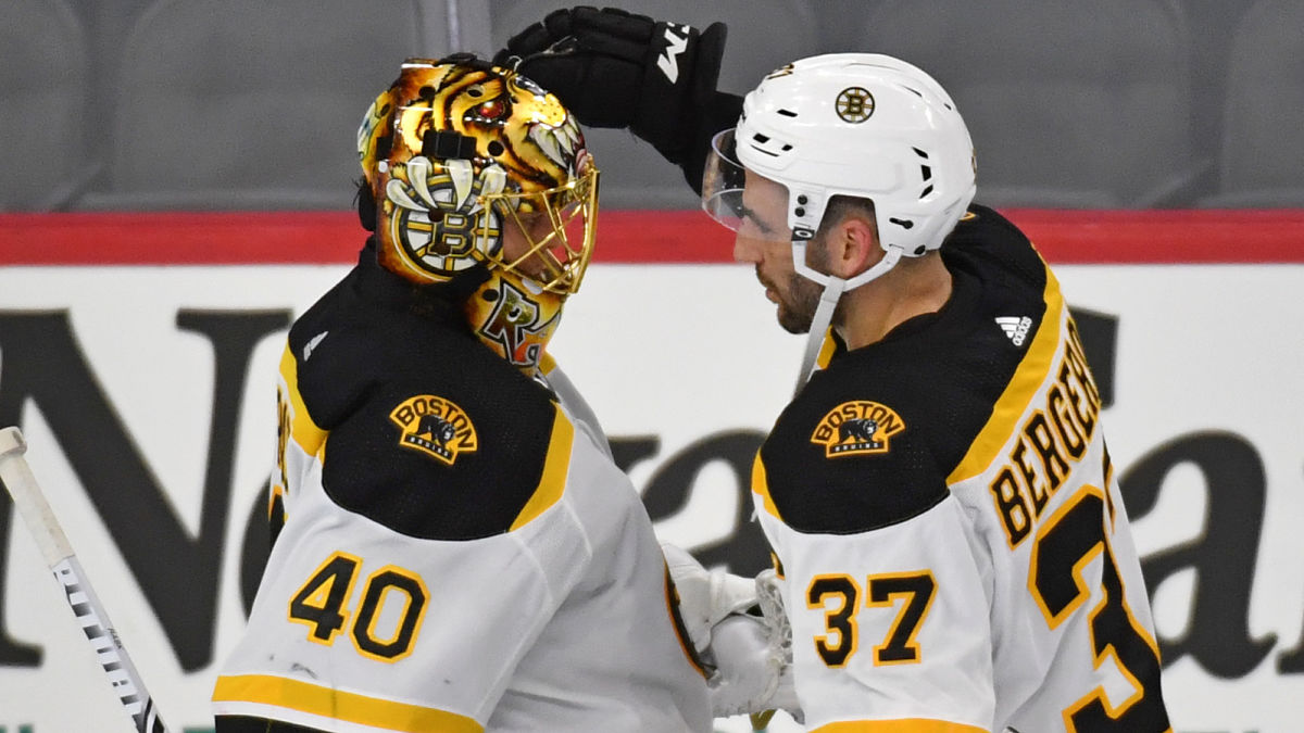 Boston Bruins goalie Tuukka Rask and center Patrice Bergeron