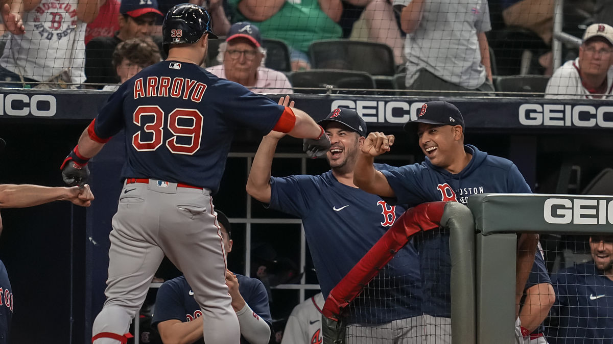 Boston Red Sox second baseman Christian Arroyo and manager Alex Cora