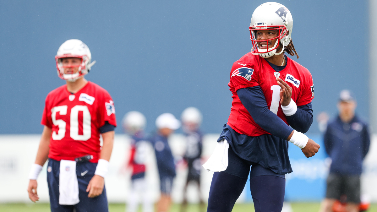 New England Patriots quarterbacks Cam Newton, Mac Jones