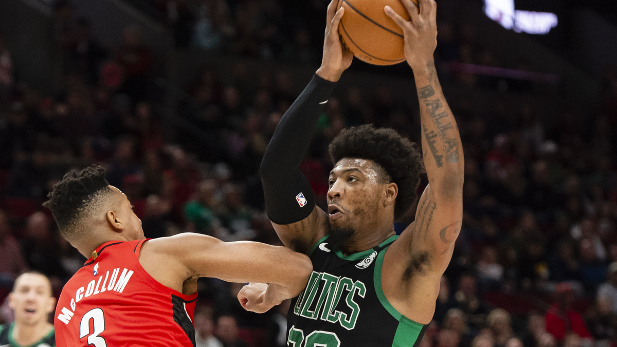 Boston Celtics guard Marcus Smart, Portland Trail Blazers guard CJ McCollum