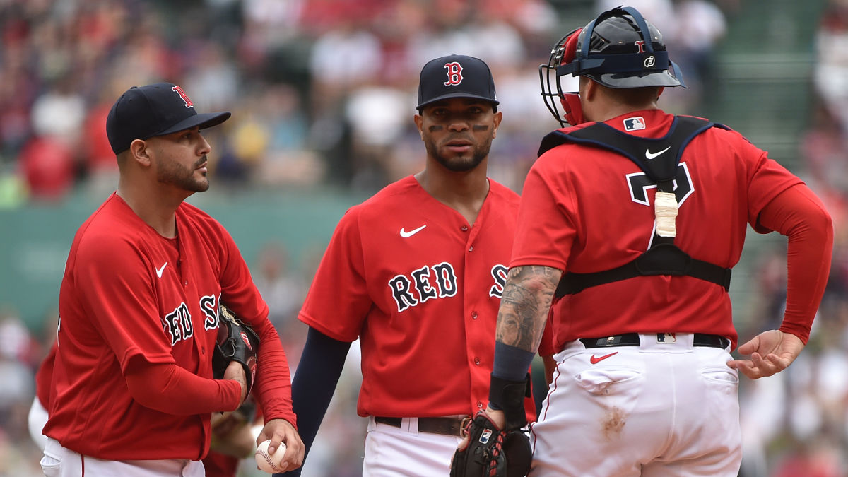 Boston Red Sox shortstop Xander Bogaerts (2) catcher Christian Vazquez (7) speak with starting pitcher Martin Perez