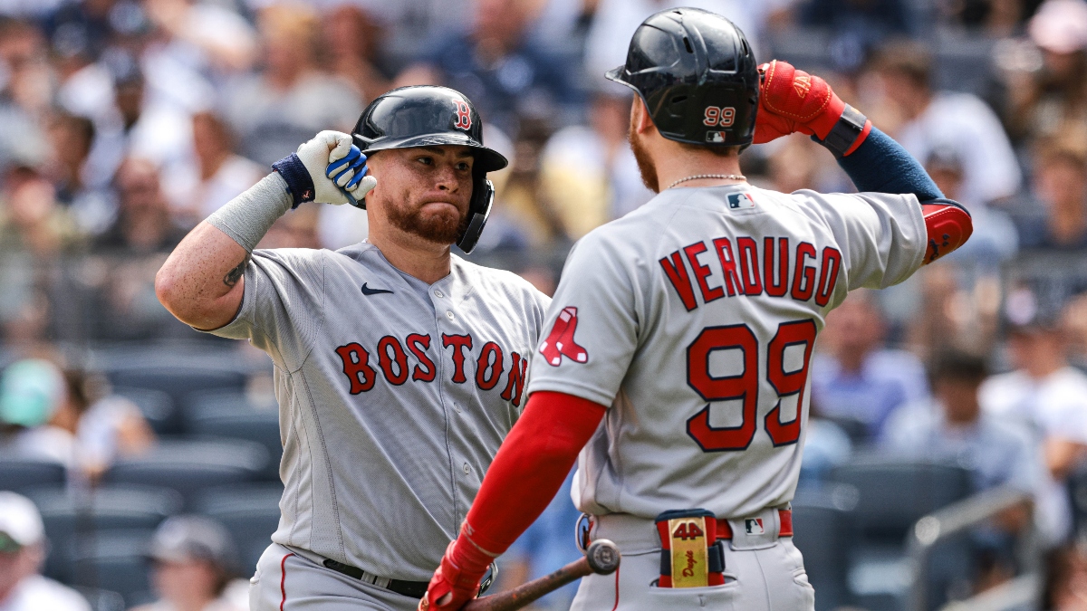 Boston Red Sox catcher Christian Vázquez (left) and outfielder Alex Verdugo