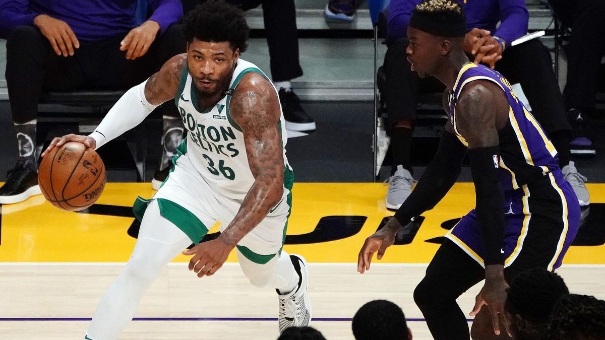 Boston Celtics guard Marcus Smart, NBA free agent Dennis Schröder
