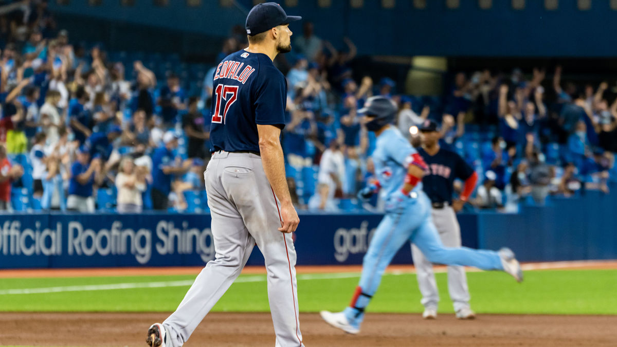 Boston Red Sox pitcher Nathan Eovaldi and Toronto Blue Jays outfielder Lourdes Gurriel Jr.