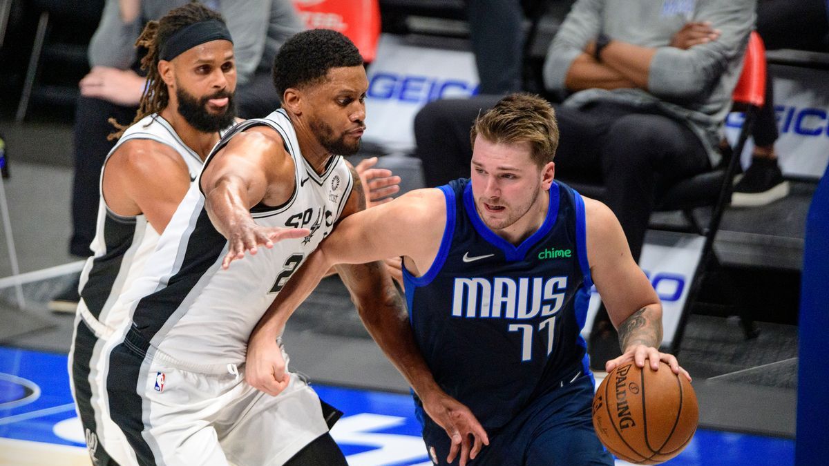 San Antonio Spurs' Rudy Gay, Patty Mills, Dallas Mavericks' Luka Doncic