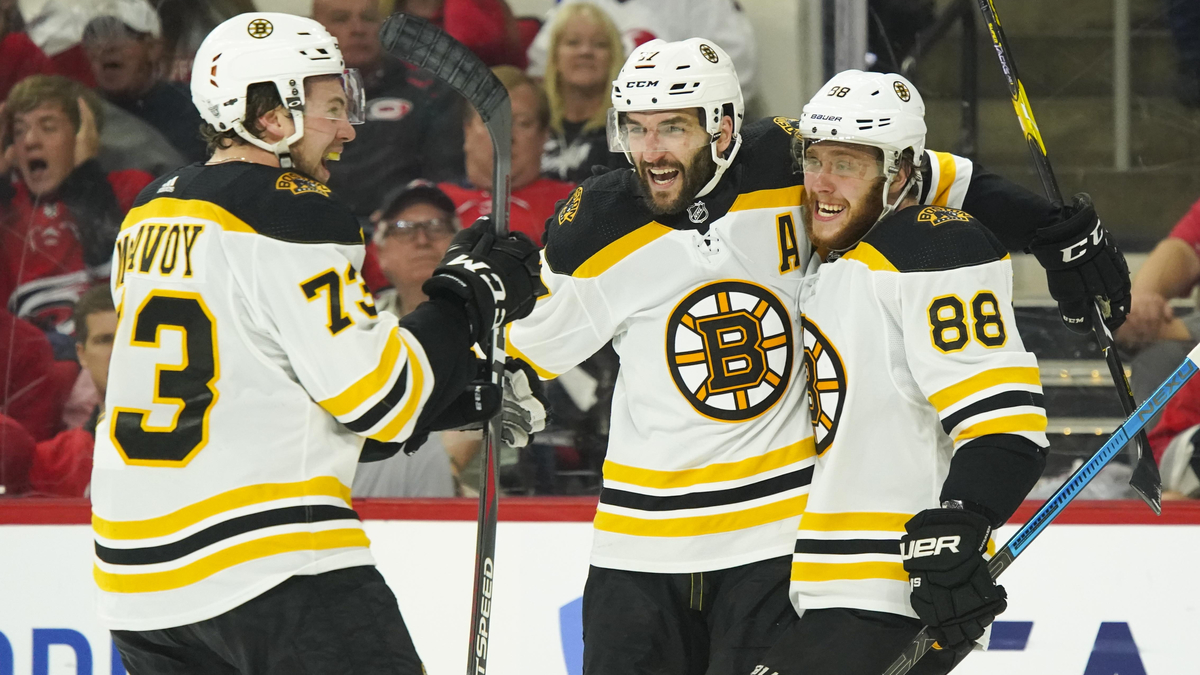 Boston Bruins defenseman Charlie McAvoy And Forwards Patrice Bergeron And David Pastrnak