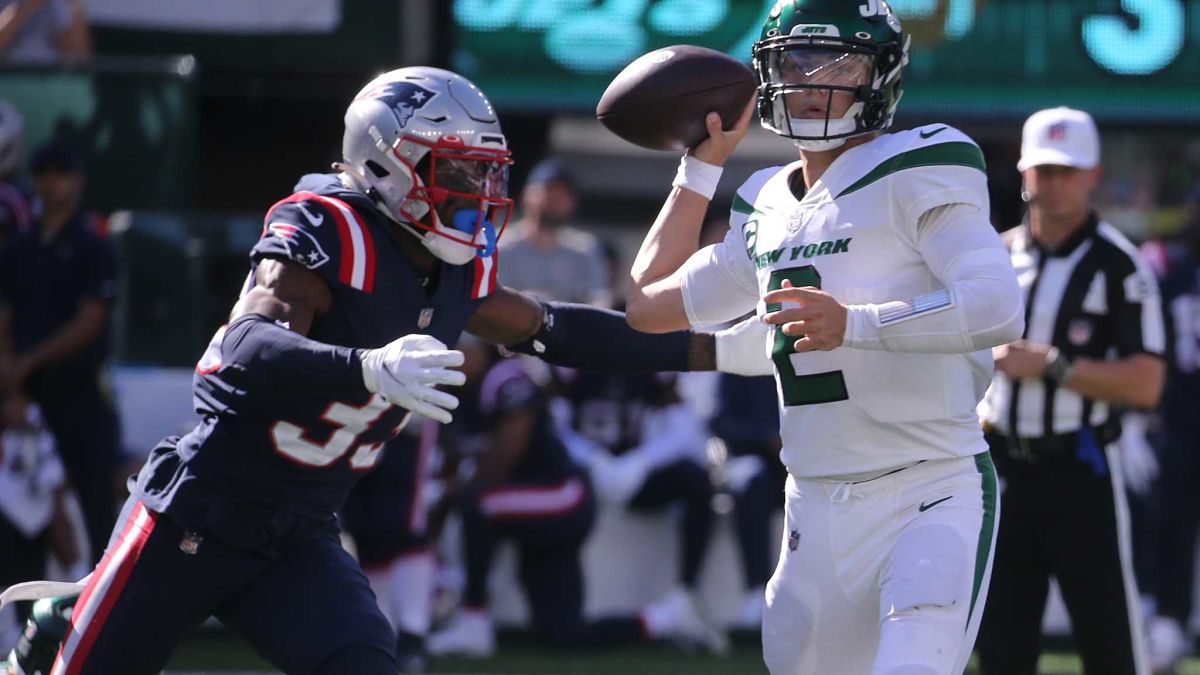New England Patriots defensive back Joejuan Williams and New York Jets quarterback Zach Wilson