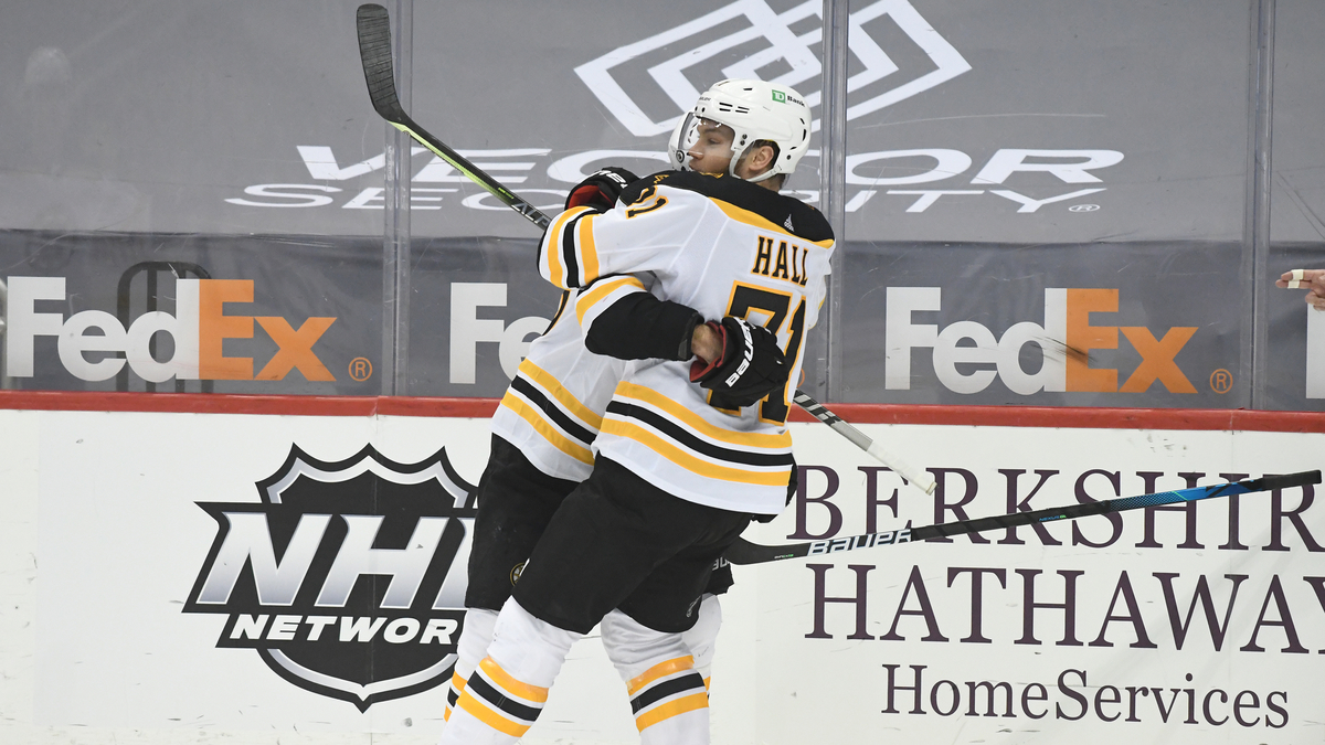 Boston Bruins winger Taylor Hall, center David Krejci