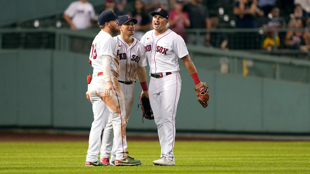 Boston Red Sox outfielders Alex Verdugo, Enrique Hernandez, Hunter Renfroe