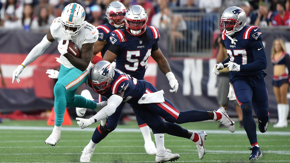 New England Patriots and Miami Dolphins players