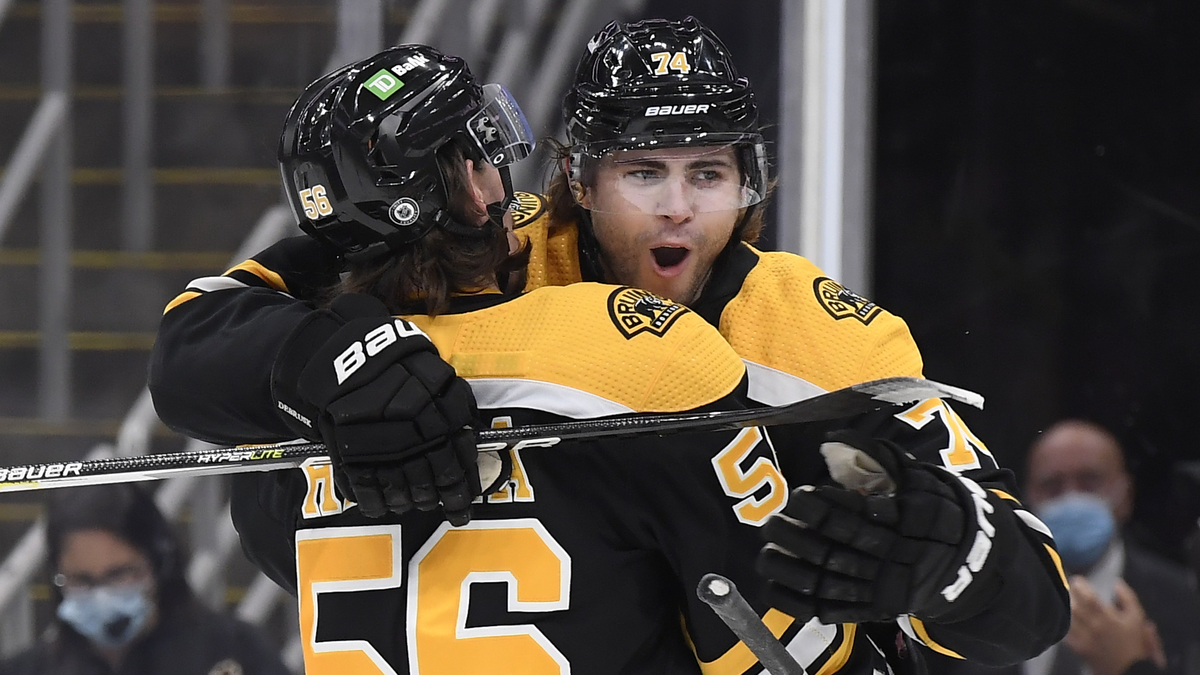 Boston Bruins forwards Jake DeBrusk and Erik Haula