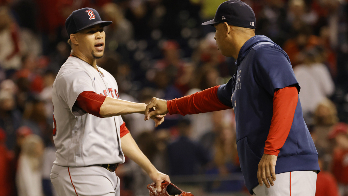 Boston Red Sox manager Alex Cora, relief pitcher Hansel Robles