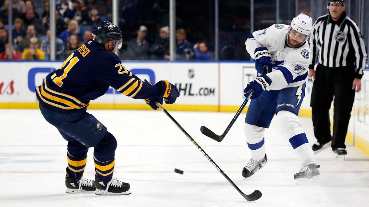 Buffalo Sabres right wing Kyle Okposo (21) and Tampa Bay Lightning defenseman Victor Hedman (77)