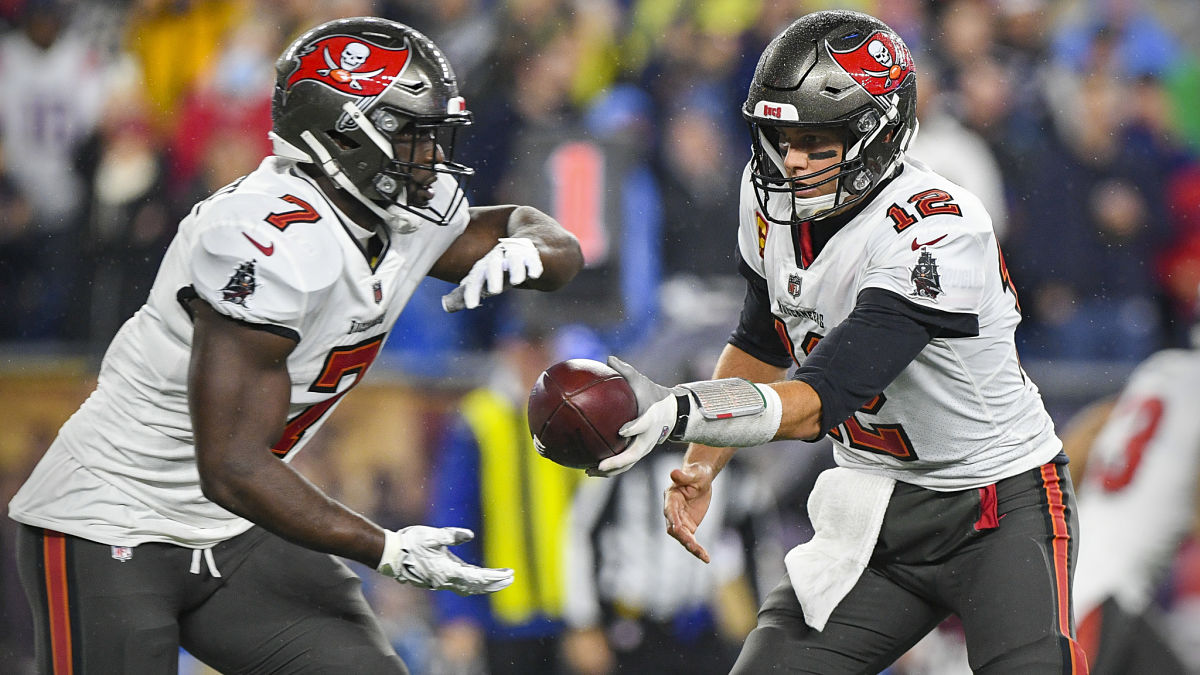 Tampa Bay Buccaneers running back Leonard Fournette and quarterback Tom Brady