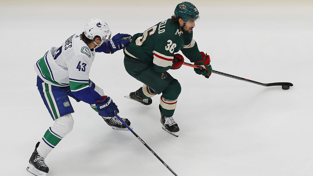 Vancouver Canucks defenseman Quinn Hughes and Minnesota Wild forward Mats Zuccarello