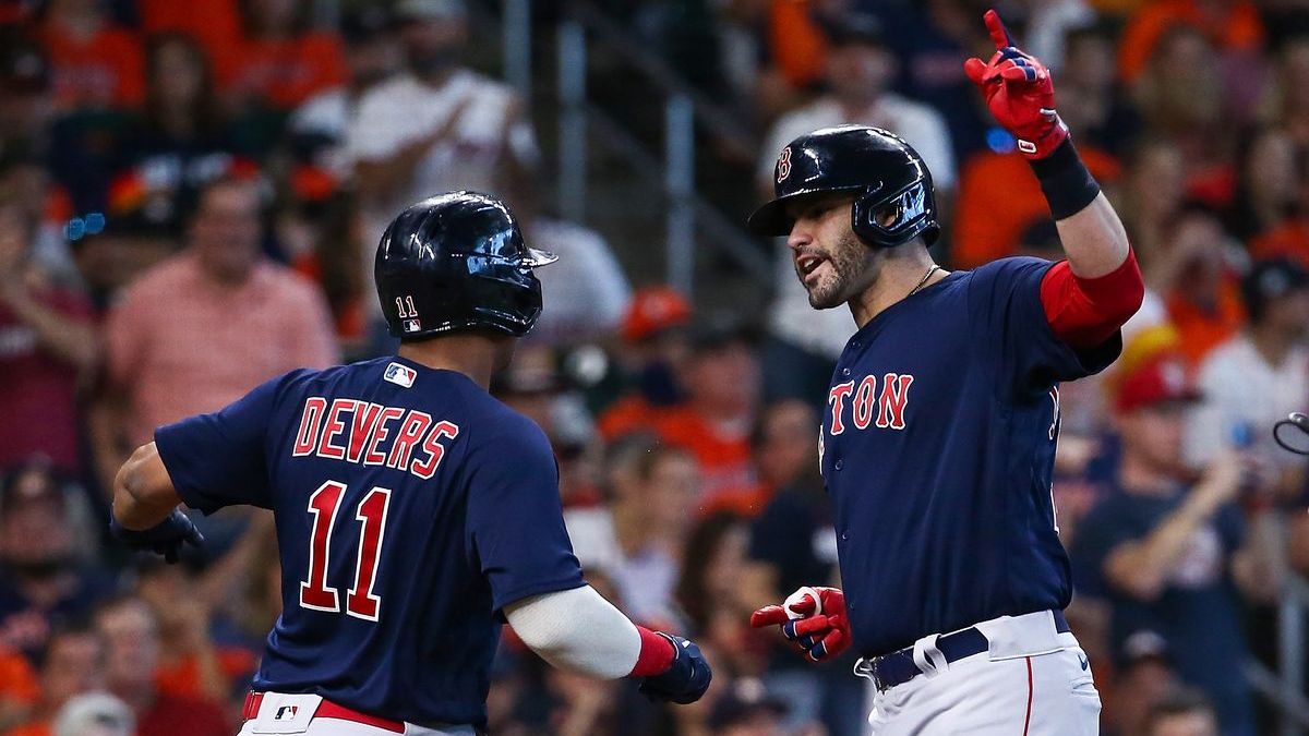 Boston Red Sox third baseman Rafael Devers, designated hitter J.D. Martinez