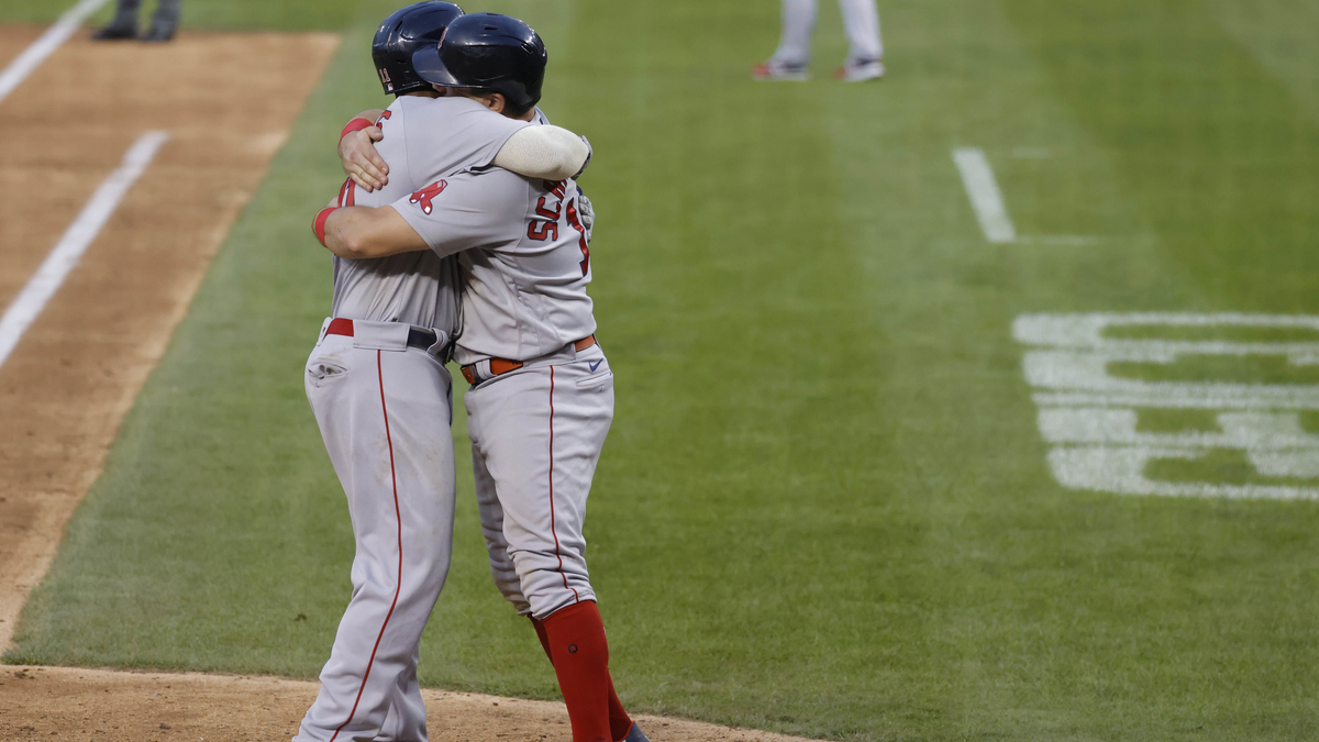 Boston Red Sox third baseman Rafael Devers, first baseman Kyle Schwarber